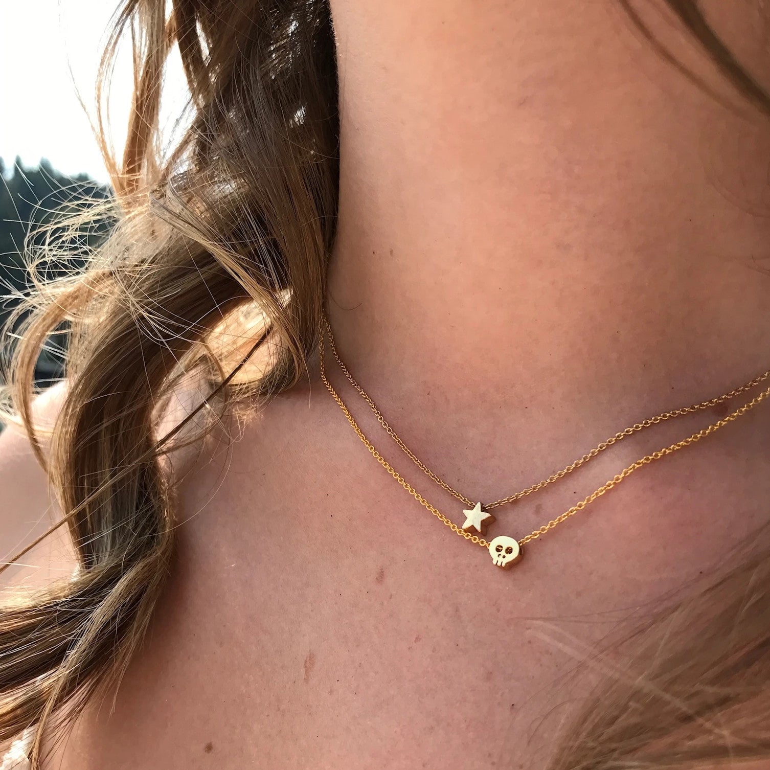 Tiny skull necklace deals