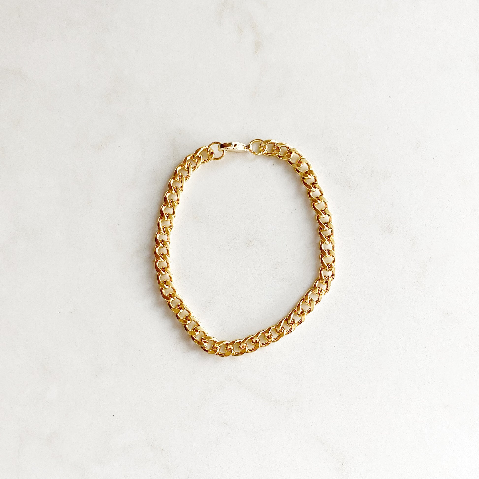 Gold curb chain bracelet